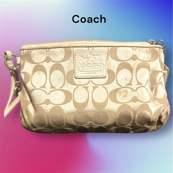 Coach Handbags - Large Coach Tan Wristlet